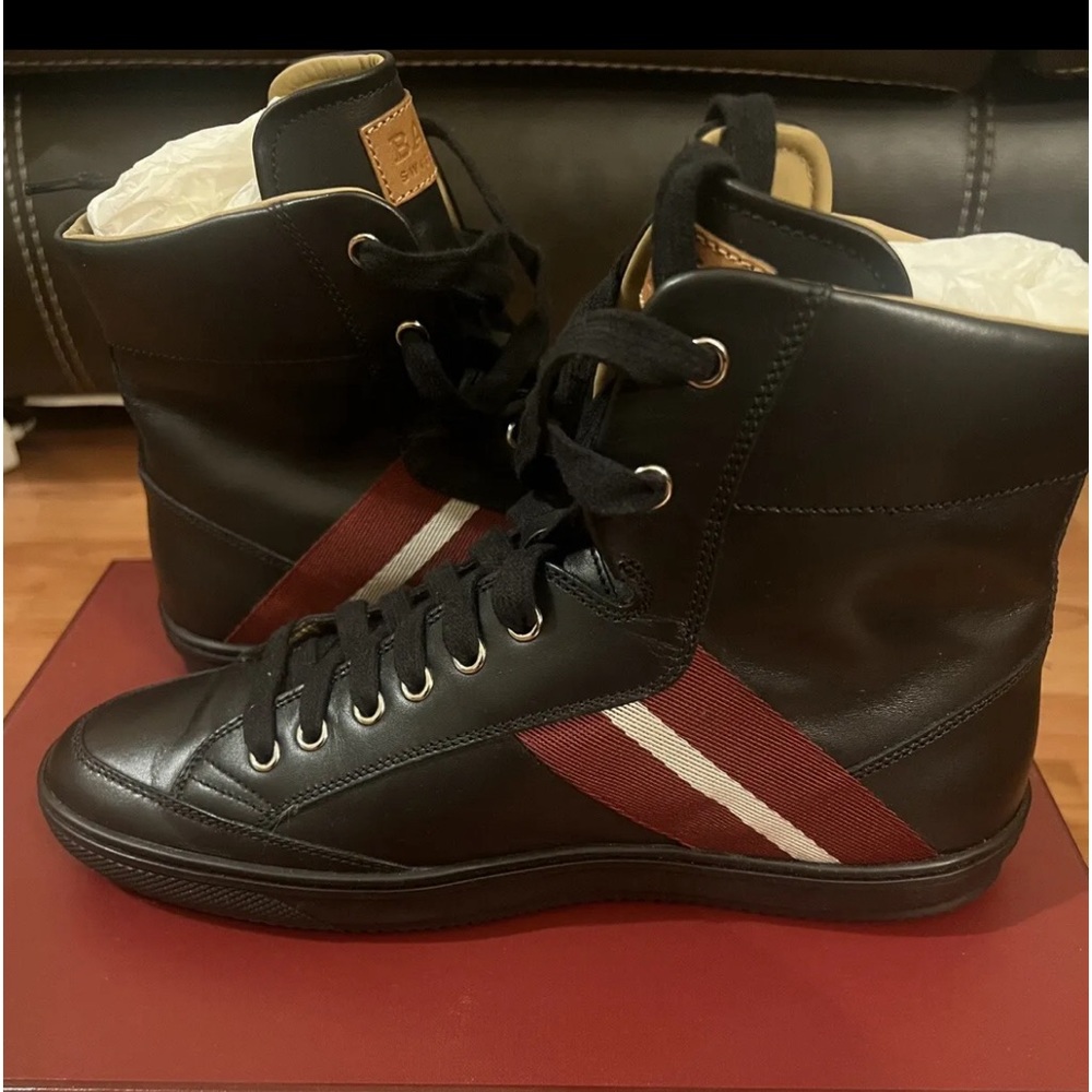 Hi Top Black leather sneaker. Basically New. Worn once.